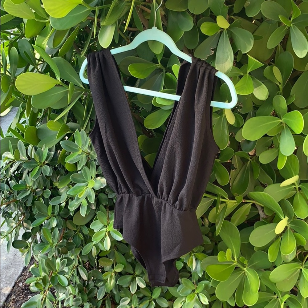 Black leotard deep split in front and back